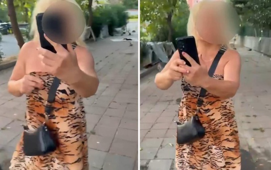 Kedileri besleyen kadın, insanların sokaktan geçmesine izin vermedi