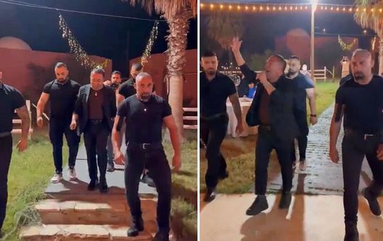 Murat Övüç'ün 4 korumayla sahneye çıktığı görüntü tartışma yarattı
