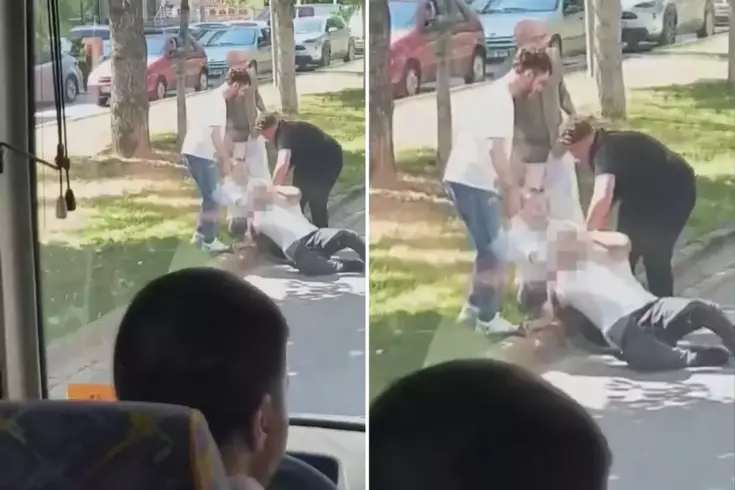 Trafikte boğazına kemer geçirdiği adamı yerde sürükledi