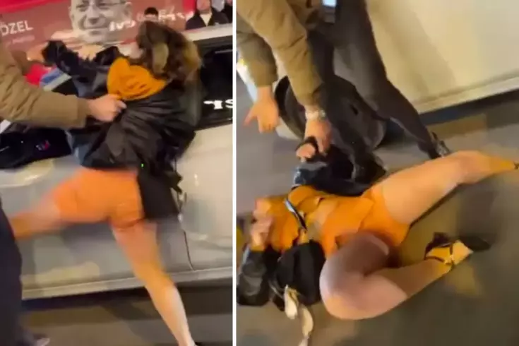 Sinir krizi geçiren kadın, vatandaşlara saldırıp kendini yerlere attı