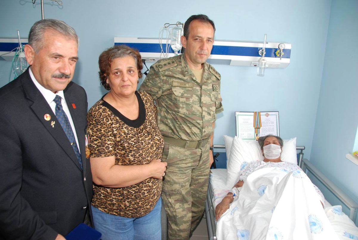 Kore Gazisinin Eşini Ziyaret Ettiler