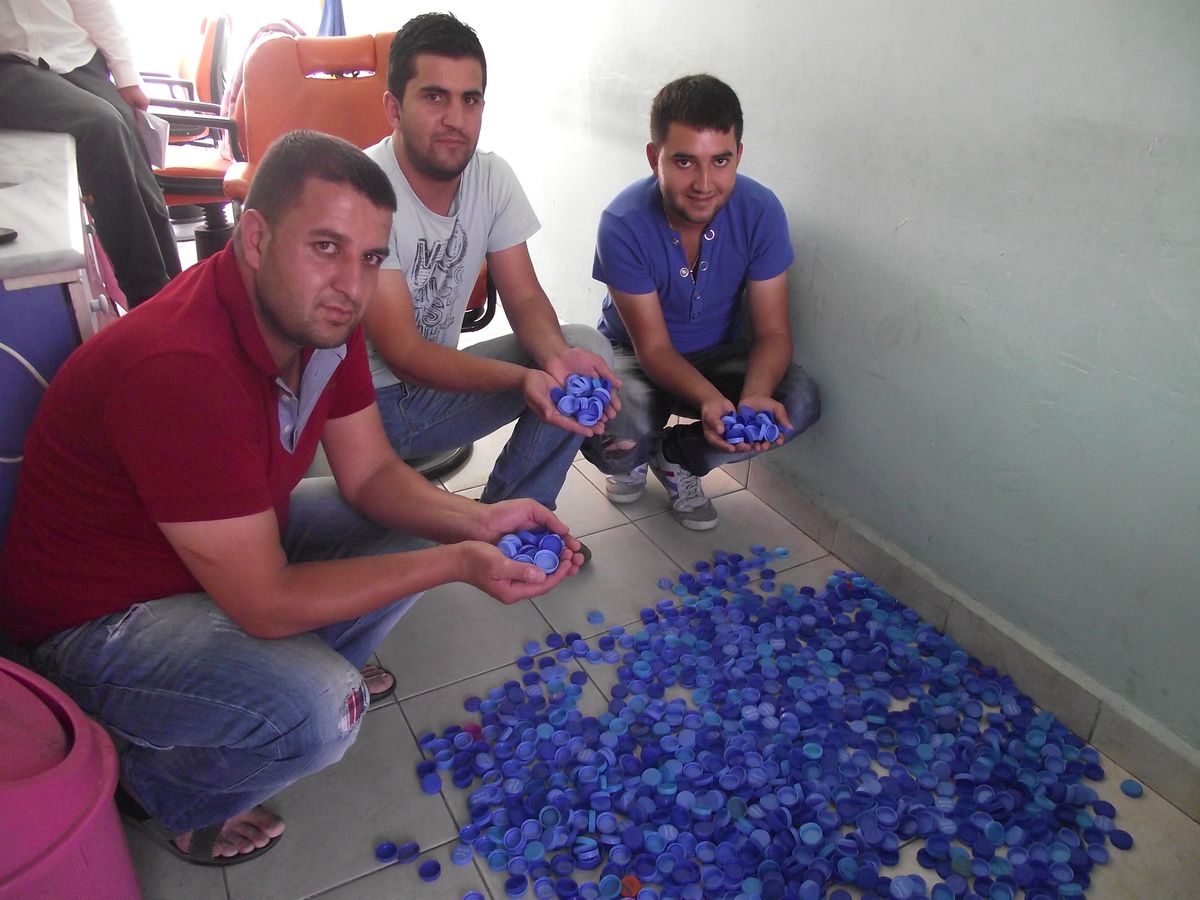 Sarıkaya Esnafından Mavi Kapak Kampanyasına Destek
