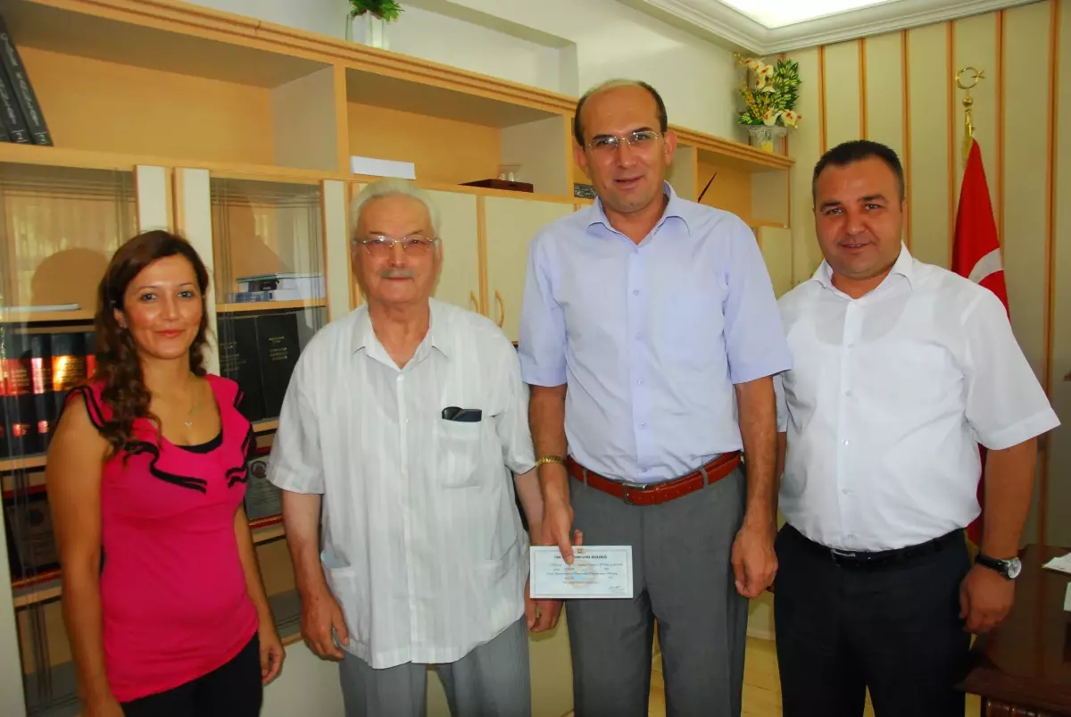 THK Fitre ve Zekât Çekini Kaymakama Teslim Etti