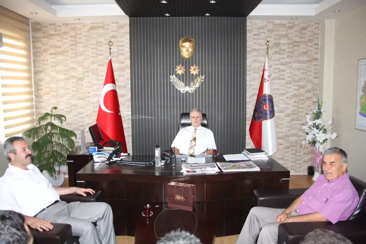 MHP İlçe Yönetiminden Taşkıran'a Ziyaret