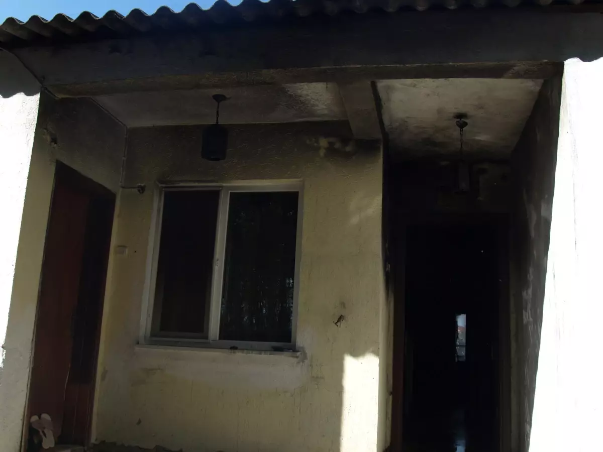 Alevlerin Arasında Kalan Engelli Genci Annesi Kurtardı