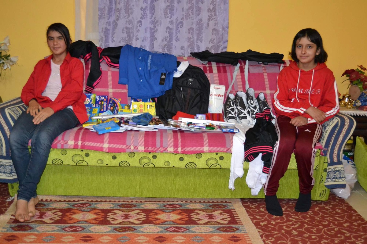Fakir Aileye Kocasinan ve Melikgazi Belediyesinden Eğitim Desteği