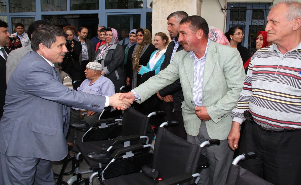 Kula\'da Engellilere Akülü Araba Dağıtıldı