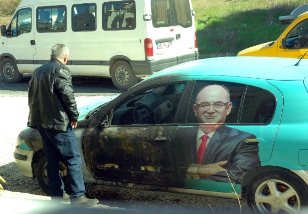 AK Parti Adaylarının Posteriyle Giydirilmiş Otomobil Kundaklandı