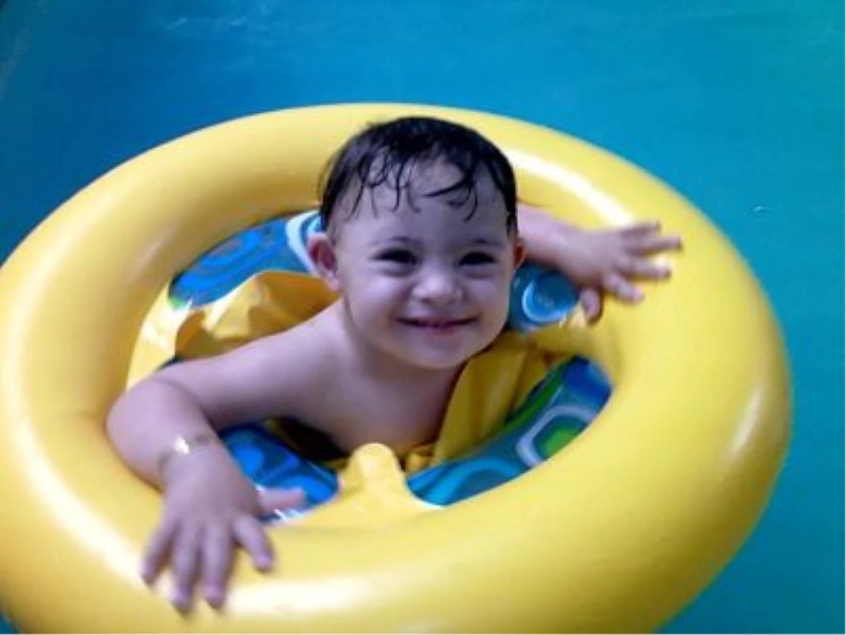 Down Sendromlu Çocuklara At ve Havuzlu Terapi