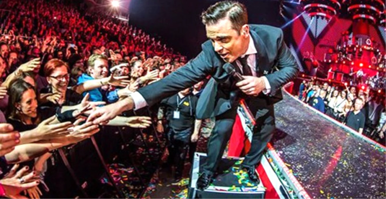 Robbie Williams Hayranının Omuzunu Kırdı