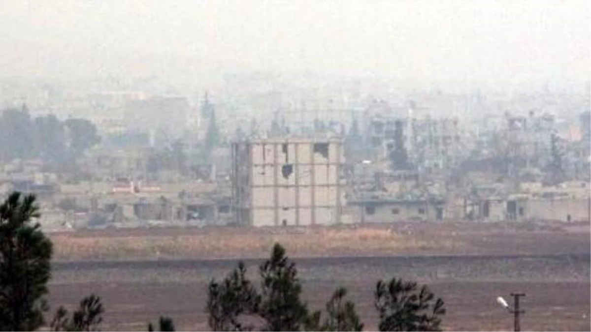 Kobani\'de Yağmur Altında Çatışma Devam Ediyor