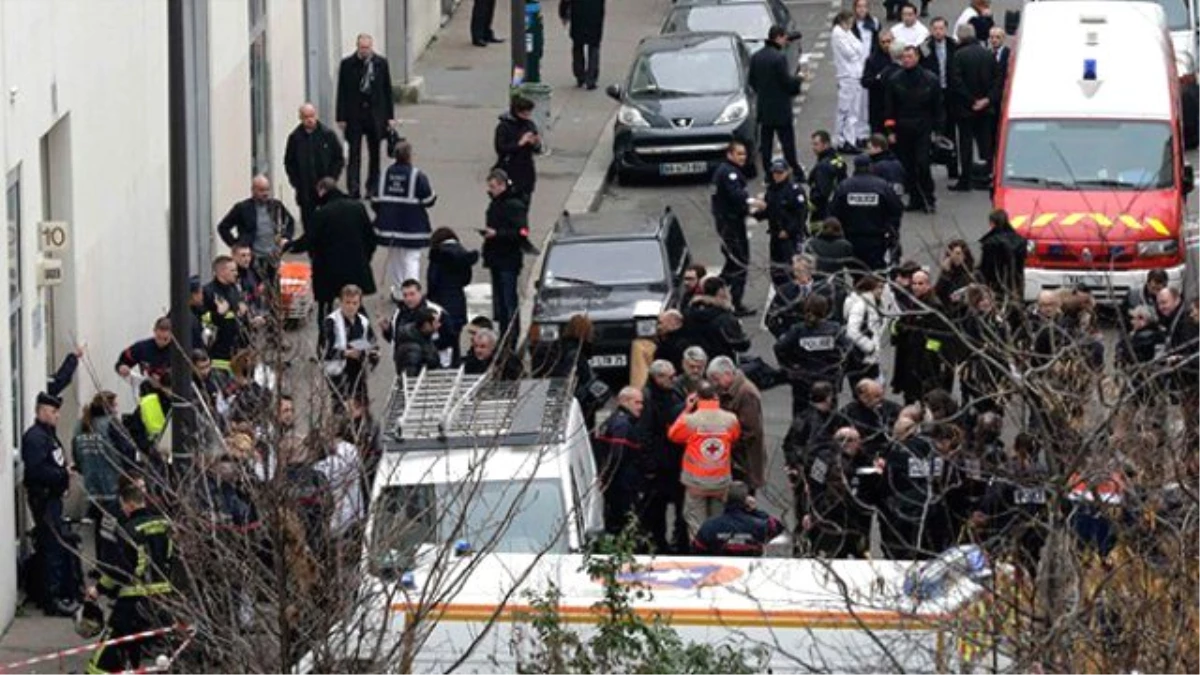 Paris\'teki Kanlı Saldırıyı Düzenleyen Şüphelilerden 1\'i Teslim Oldu, 7 Kişi de Gözaltında
