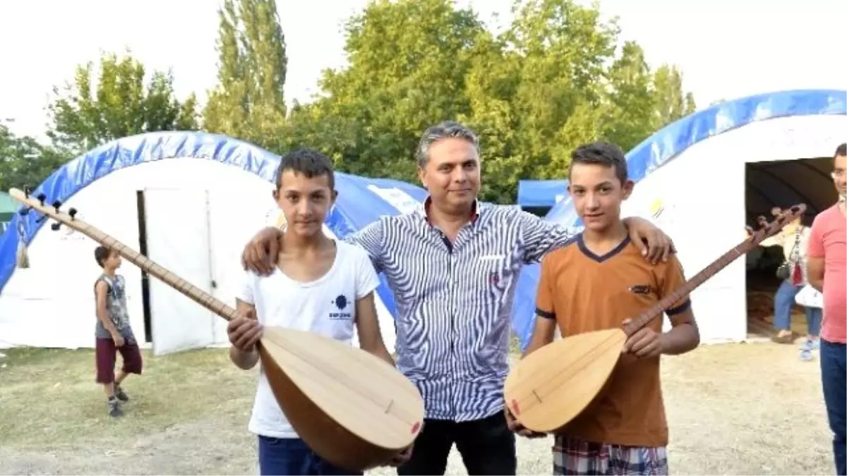 İkizlerden, Başkan Uysal\'a Bağlama Teşekkürü