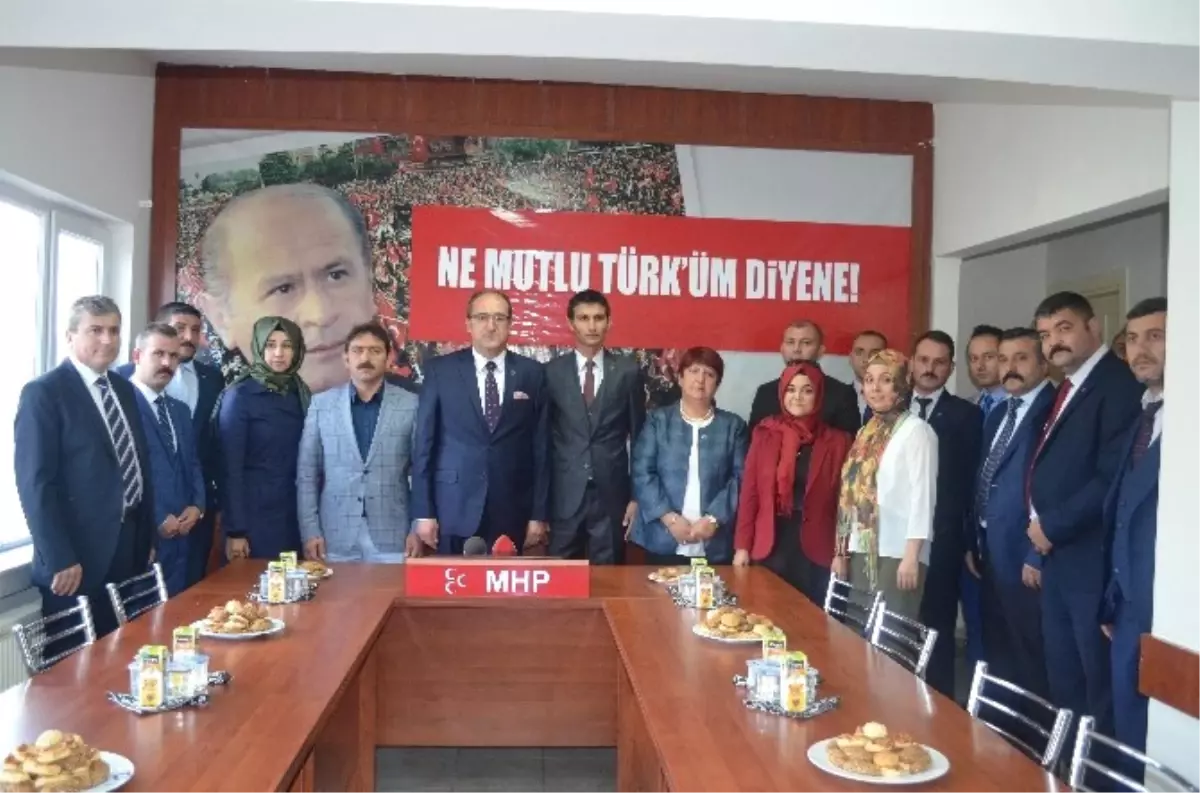 AK Parti\'li Ünlü\'den MHP\'ye Ziyaret