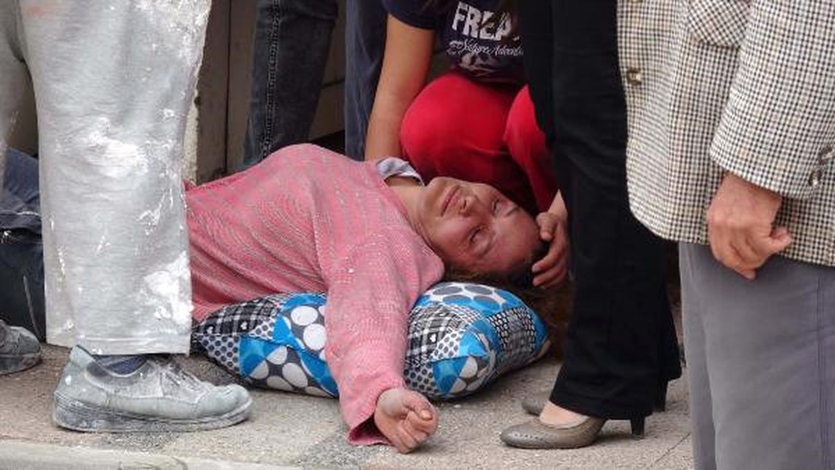 Evi Yanan Kadın Sinir Krizi Geçirdi