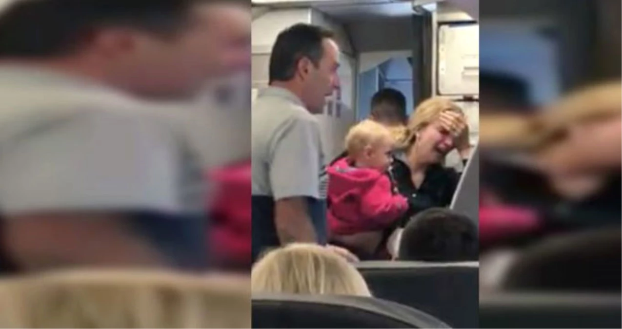 ABD\'de Havayolu Personeli, Kucağında Bebeği Olan Anneye Saldırdı