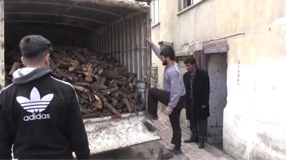 Suriyeli Sığınmacılara 100 Ton Odun Yardımı