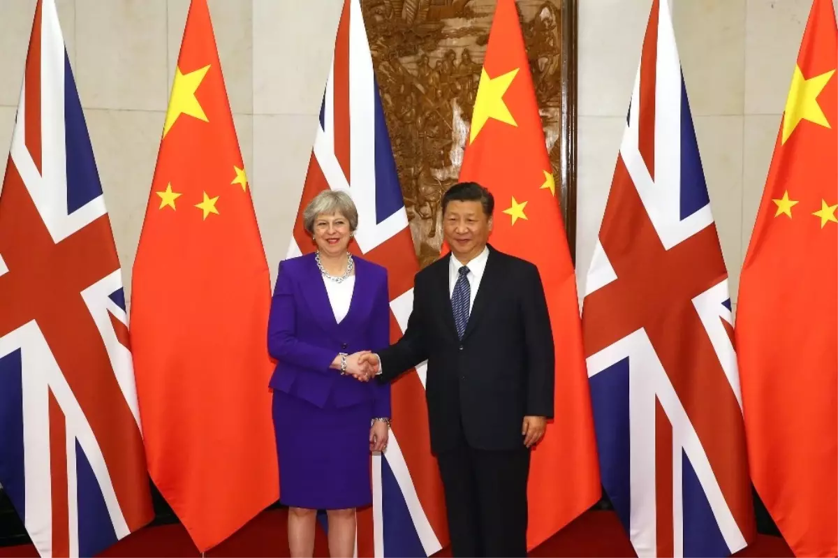 Theresa May, Çin Devlet Başkanı Jinping ile Görüştü