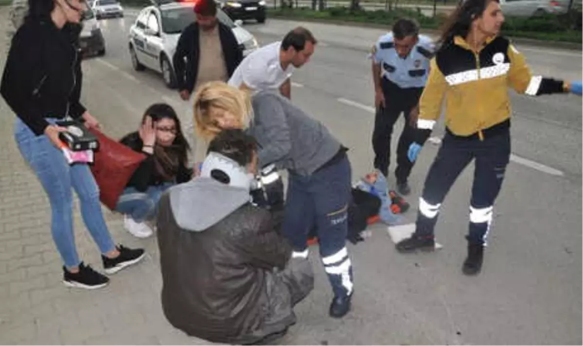 Genç Kızın Pardesüsü Motosikletin Tekerleğine Sıkıştı: 2 Yaralı