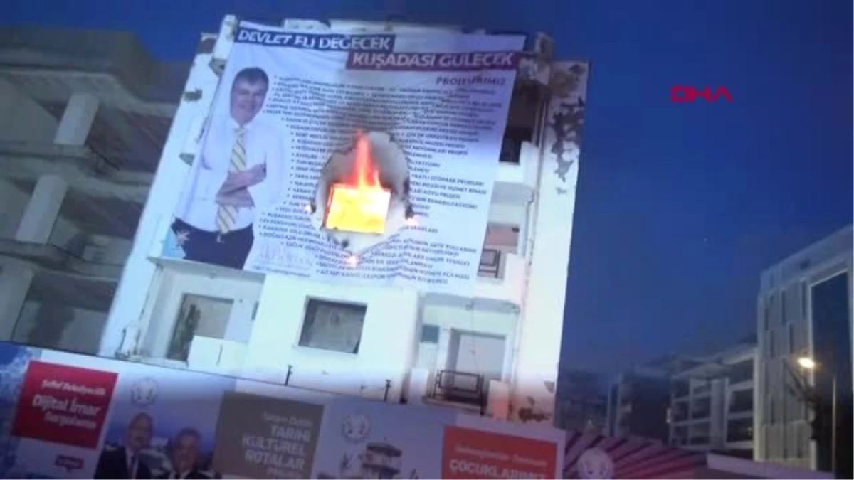 Kuşadası\'ndaki Boş Binada Çıkan Yangında AK Parti Adayının Afişi Zarar Gördü