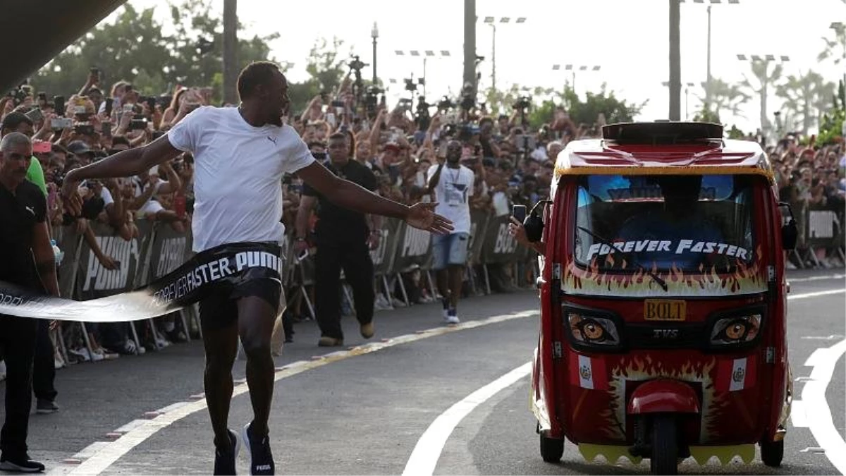 Usain Bolt Gösteri Yarışında Triportöre Fark Attı