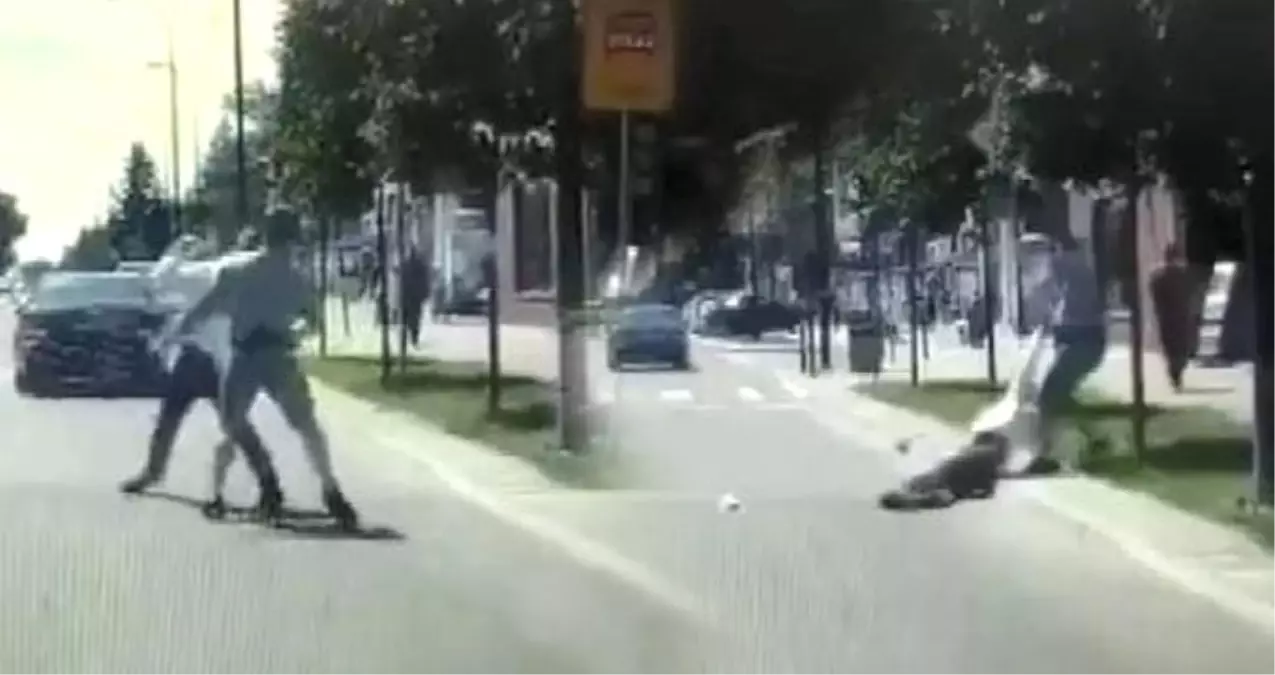 Bayılttığı adamı araba çarpmasın diye kenara çekti