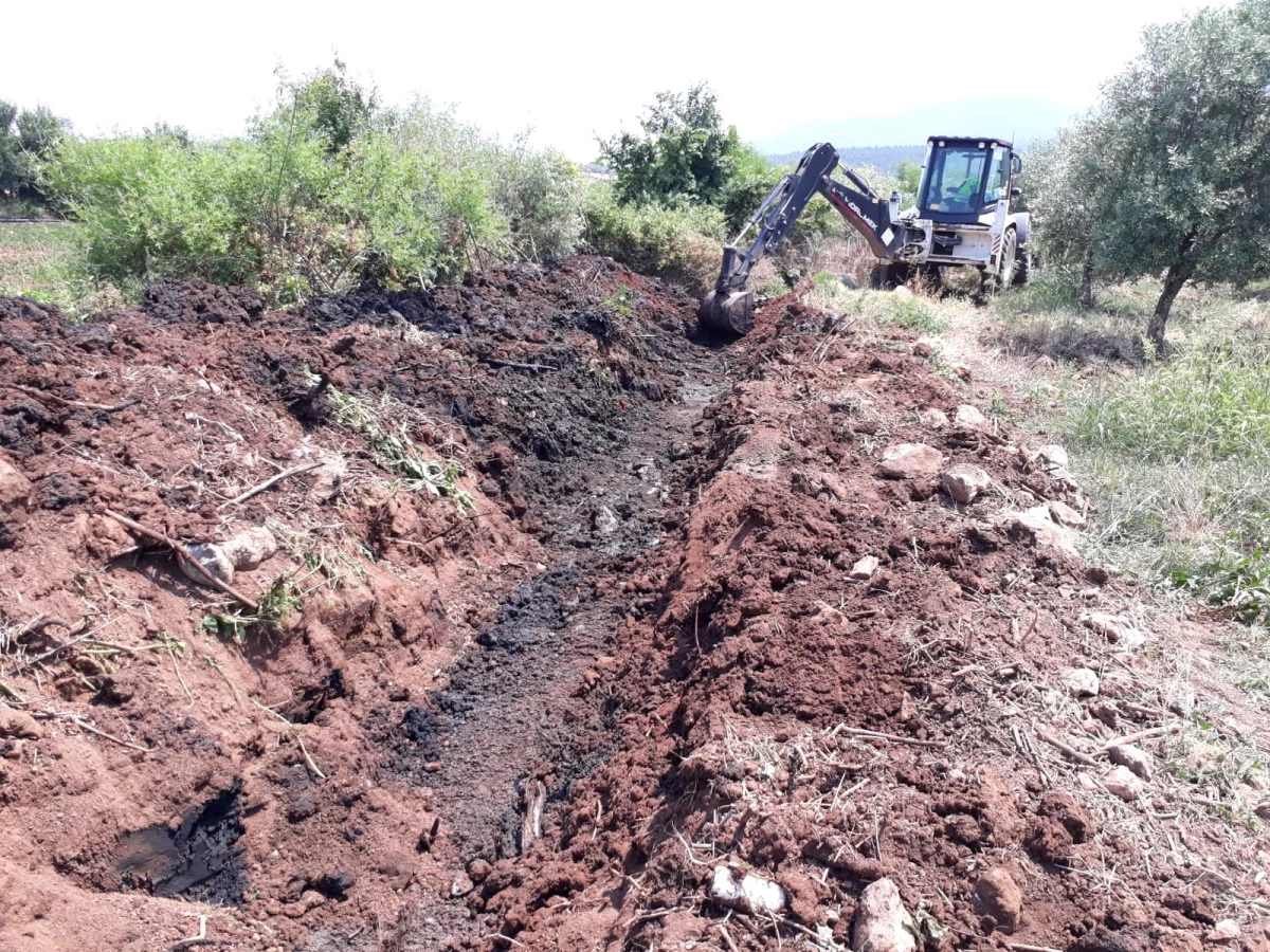 Heybeli Mahallesinde dere temizlik çalışması tamamlandı