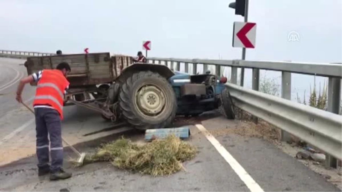 Kaza yapan traktör sürücüsü bariyeri aşıp uçuruma düştü