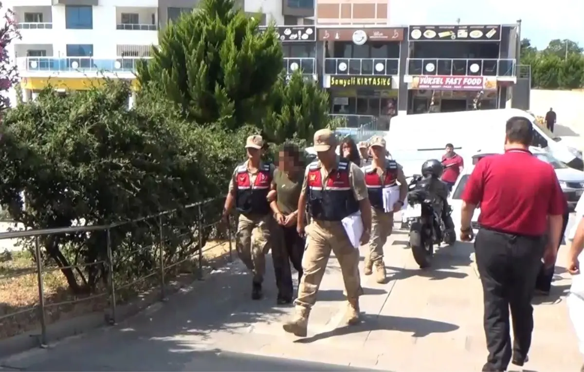 Uyanık göçmen kaçakçısı kadın, yakayı ele verdi