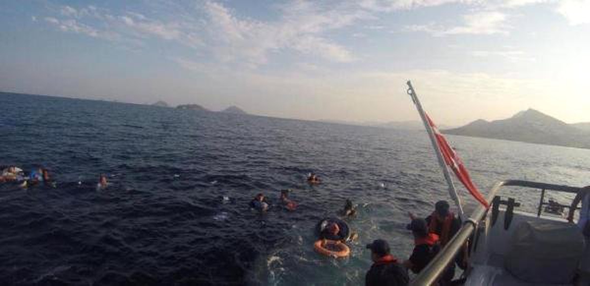Göçmen kaçakçılığı çetesi lideri ve sevgilisi, Bodrum\'a getirildi- Yeniden