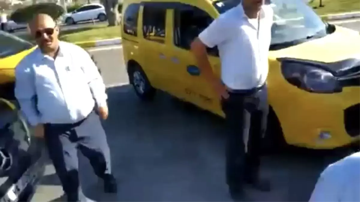 Havalimanında taksiciler ile UBER sürücüsü arasında tartışma