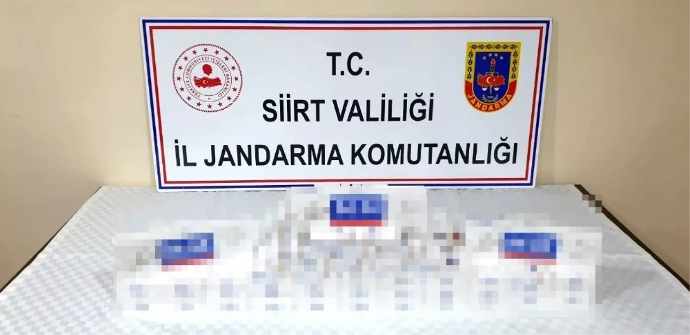 Siirt\'te minibüsün bagaj kısmına gizlenmiş kaçak sigara ele geçirildi