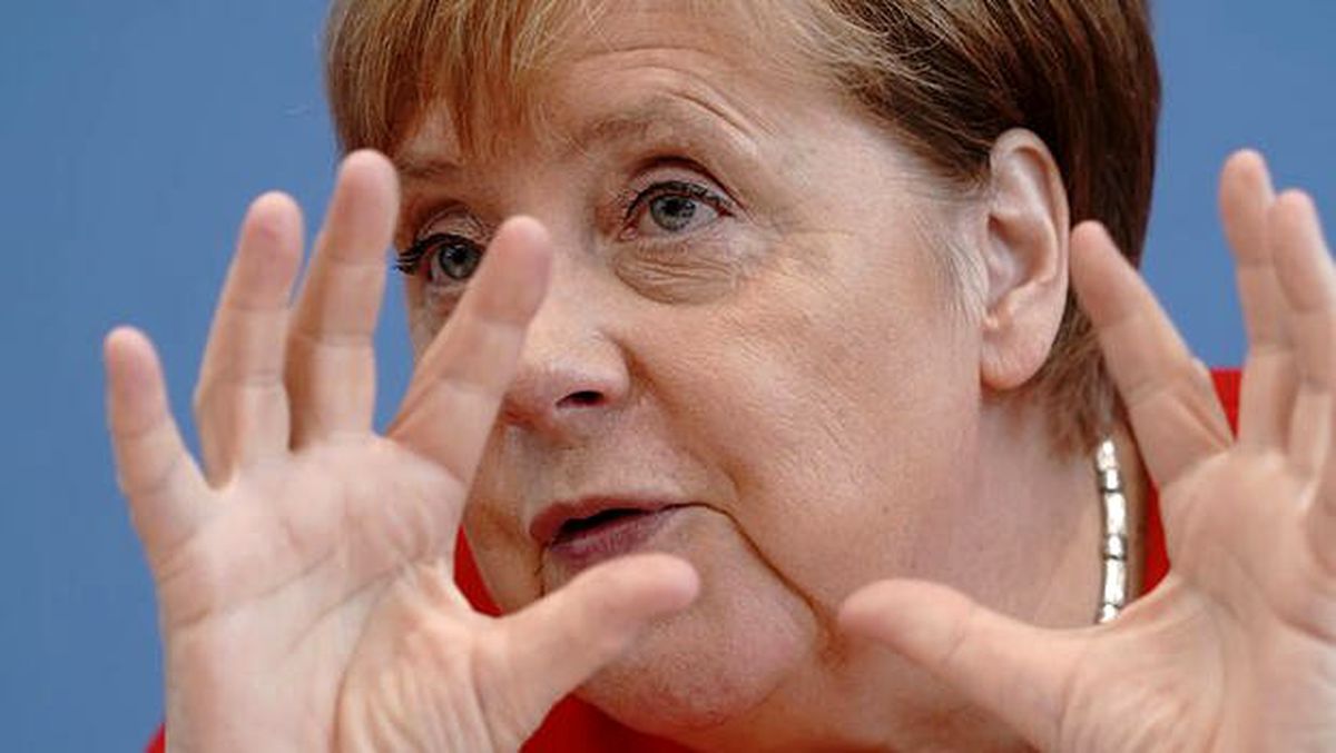 Merkel: Ekonomik yavaşlamanın nedeni \'savaş\'