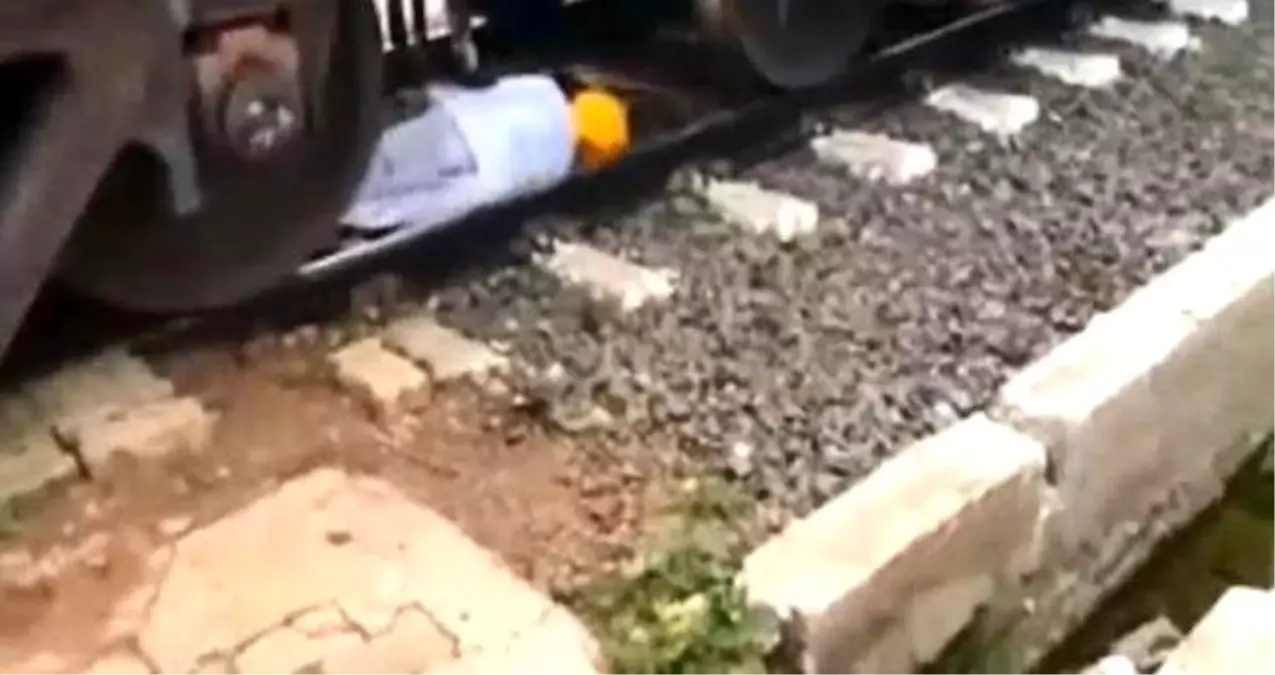 Trenin geldiğini son anda fark eden yaşlı çiftçi, raylara yatarak hayatta kaldı