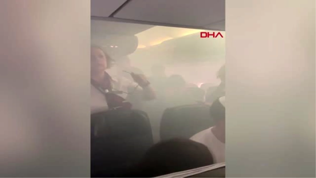 DHA DIŞ \' Yolcu uçağında korku dolu anlar\' Kabini dumanla dolan uçak acil iniş yaptı
