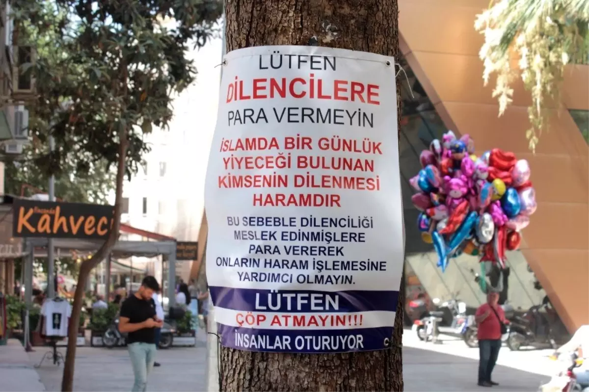 \'Dilencilere para vermeyin\' tabelasının altında dileniyorlar