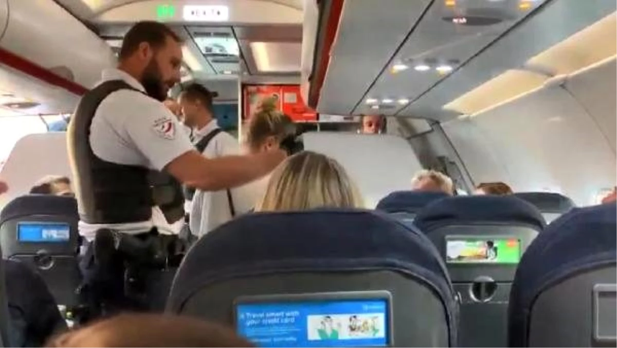 Kabin ekibiyle tartışan 2 yolcu, uçağın acil inişi sonrası gözaltına alındı