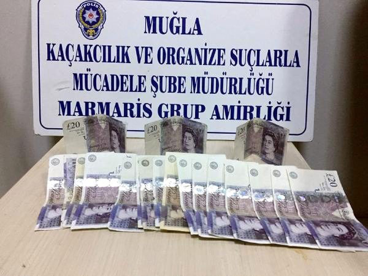 Marmaris\'te esnafı sahte sterlinle dolandıran 7 turist yakalandı