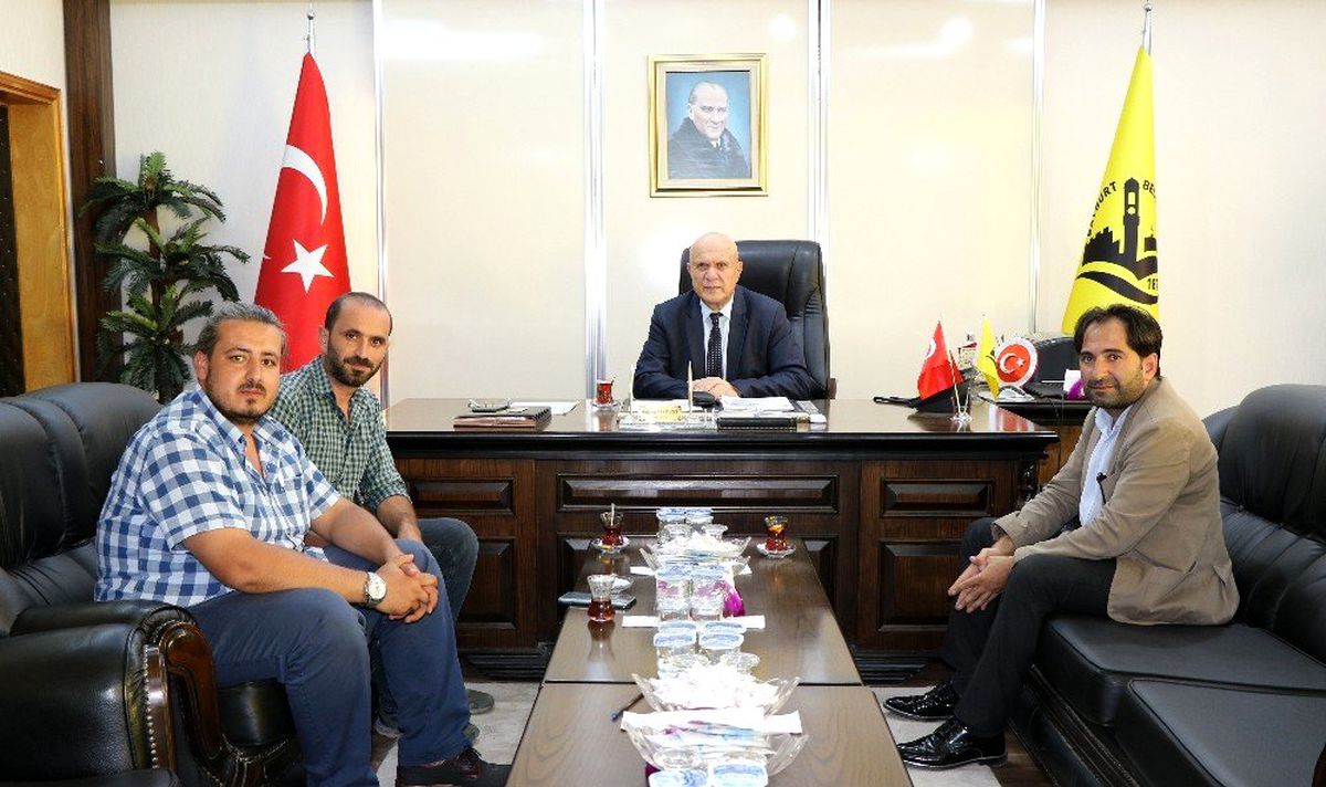 İHA Erzincan Bölge Müdürü Akbuğa, Belediye Başkanı Pekmezci\'yi ziyaret etti