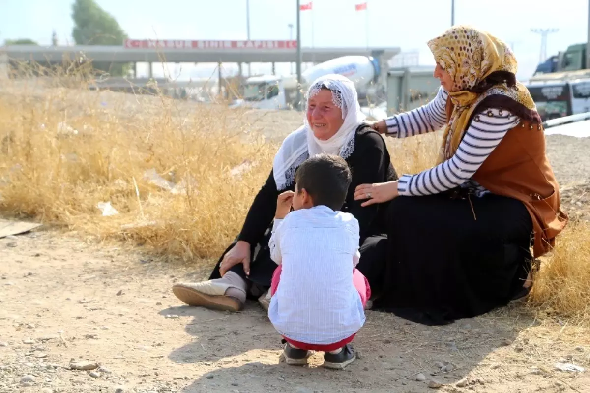 Peşmergenin elindeki genç ailesine kavuşmayı bekliyor