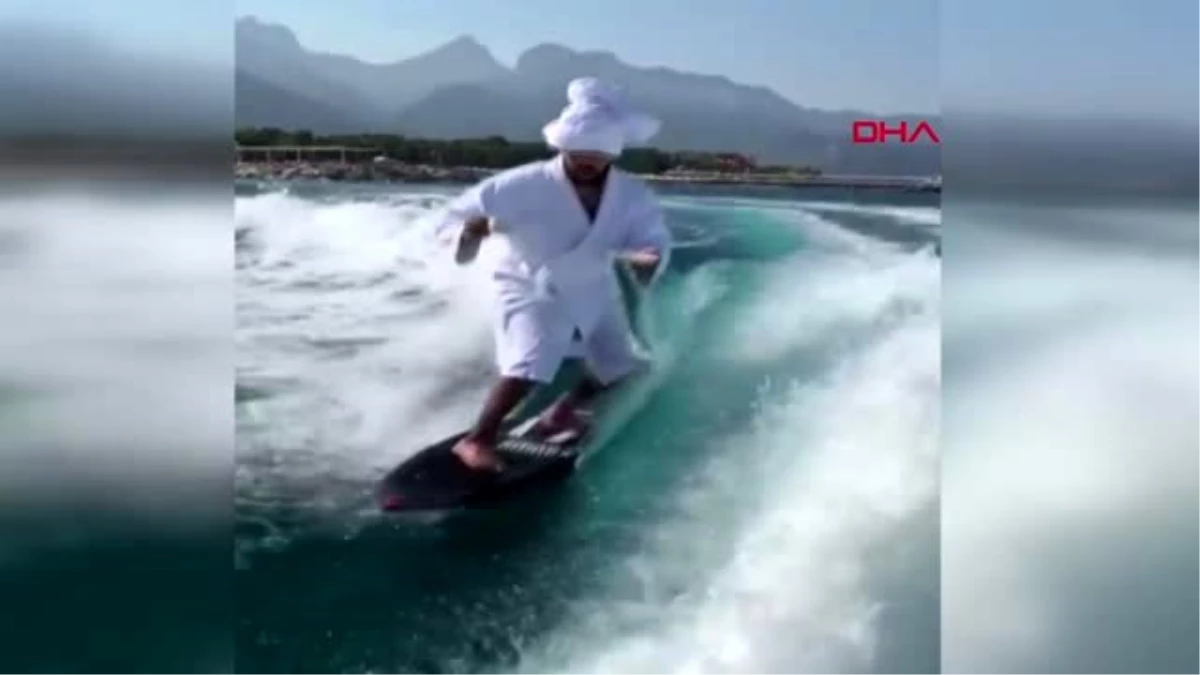 Antalya timati, kızıyla dalga sörfü yaptı, milyonlar izledi