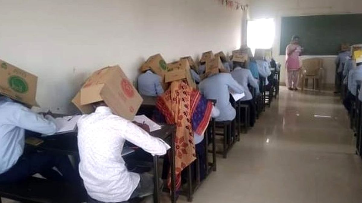Kopya çekmesinler diye öğrencilerin başına koli geçirildi