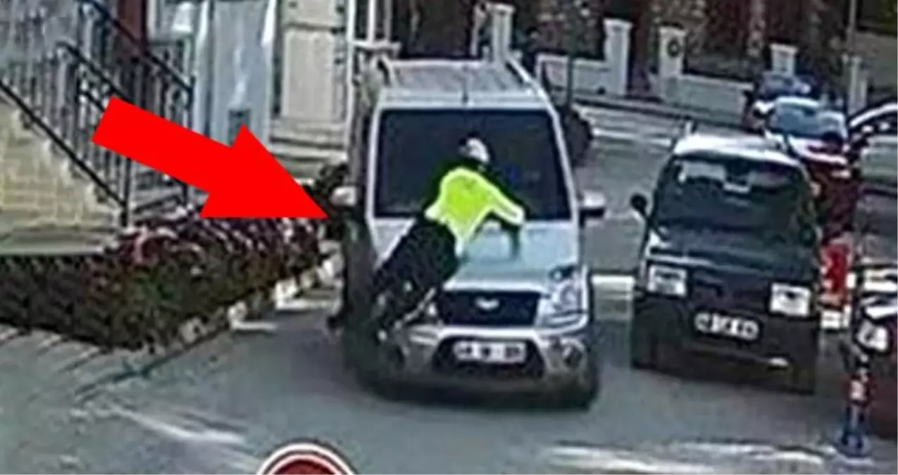 Polis memurunu araç kaportasında metrelerce sürükleyen sürücü tutuklandı