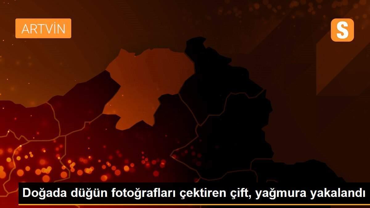 Doğada düğün fotoğrafları çektiren çift, yağmura yakalandı