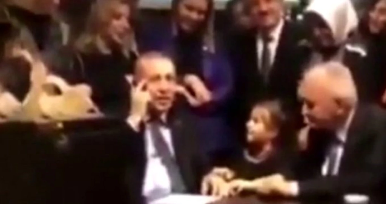 Konuşurken araya giren küçük kız "Reis dede" diyerek Erdoğan\'ı güldürdü