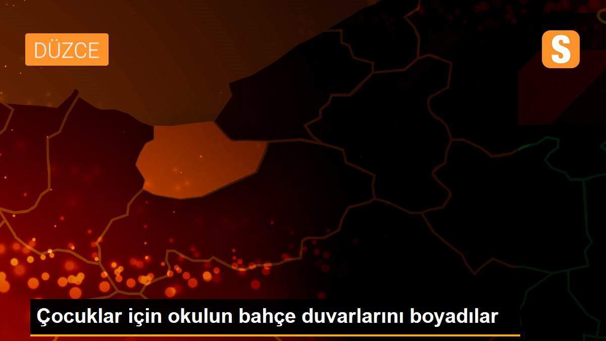 Çocuklar için okulun bahçe duvarlarını boyadılar