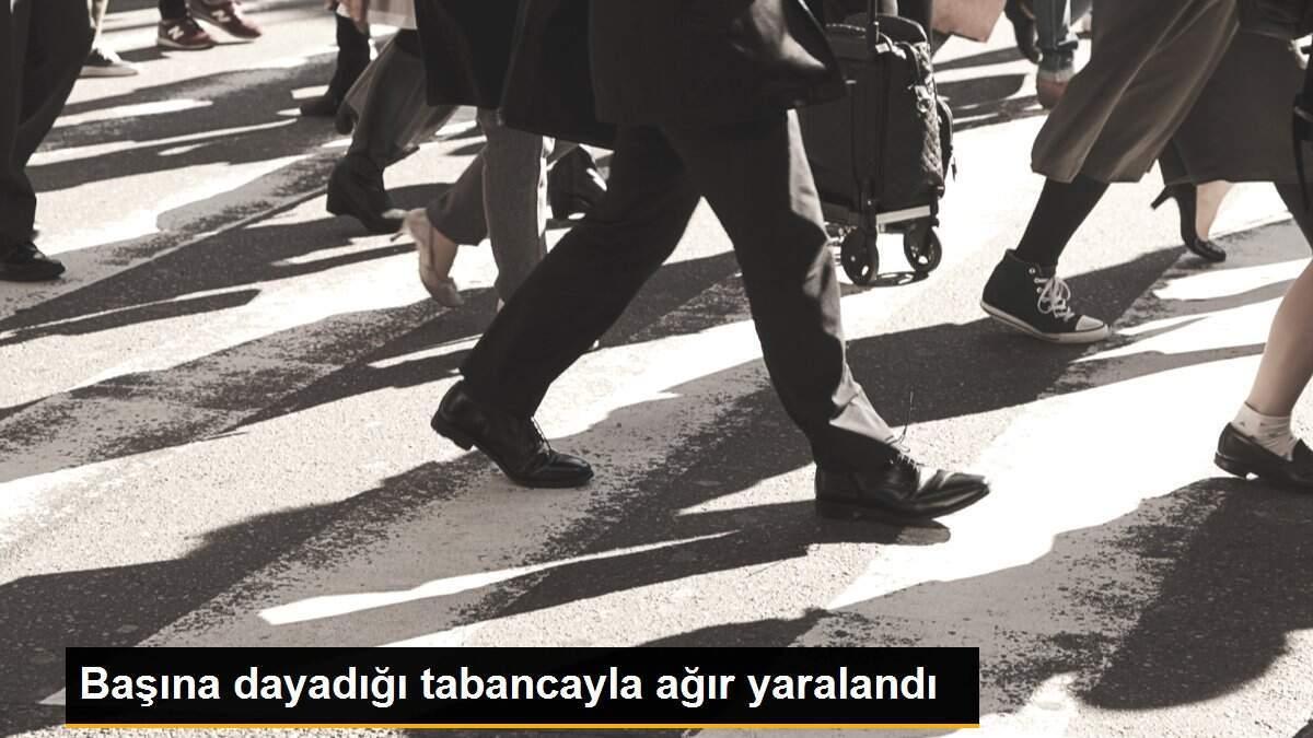 Başına dayadığı tabancayla ağır yaralandı