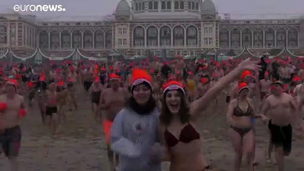 Video: Binlerce Hollandalı yeni yıl geleneği için soğuk denize girdi