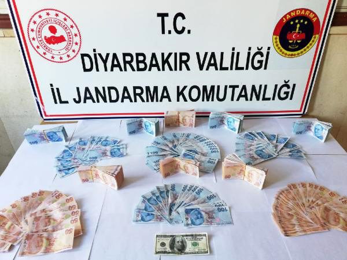 Güvenlik korucusu ve 3 kişi sahte parayla yakalandı