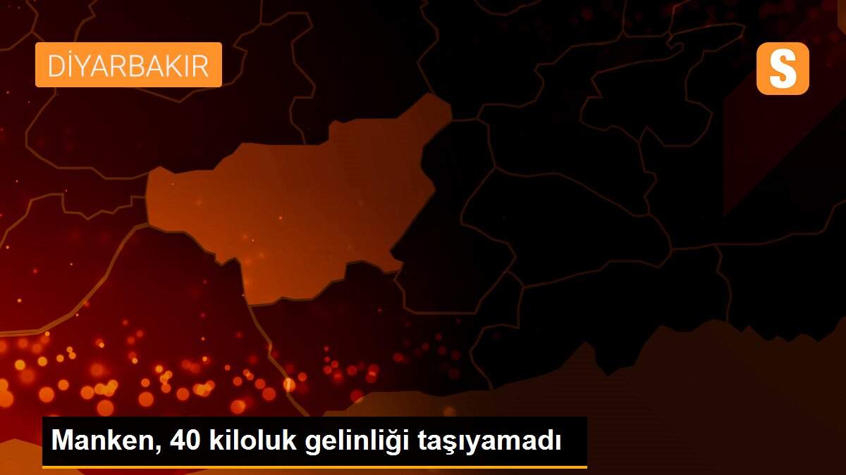 Manken, 40 kiloluk gelinliği taşıyamadı